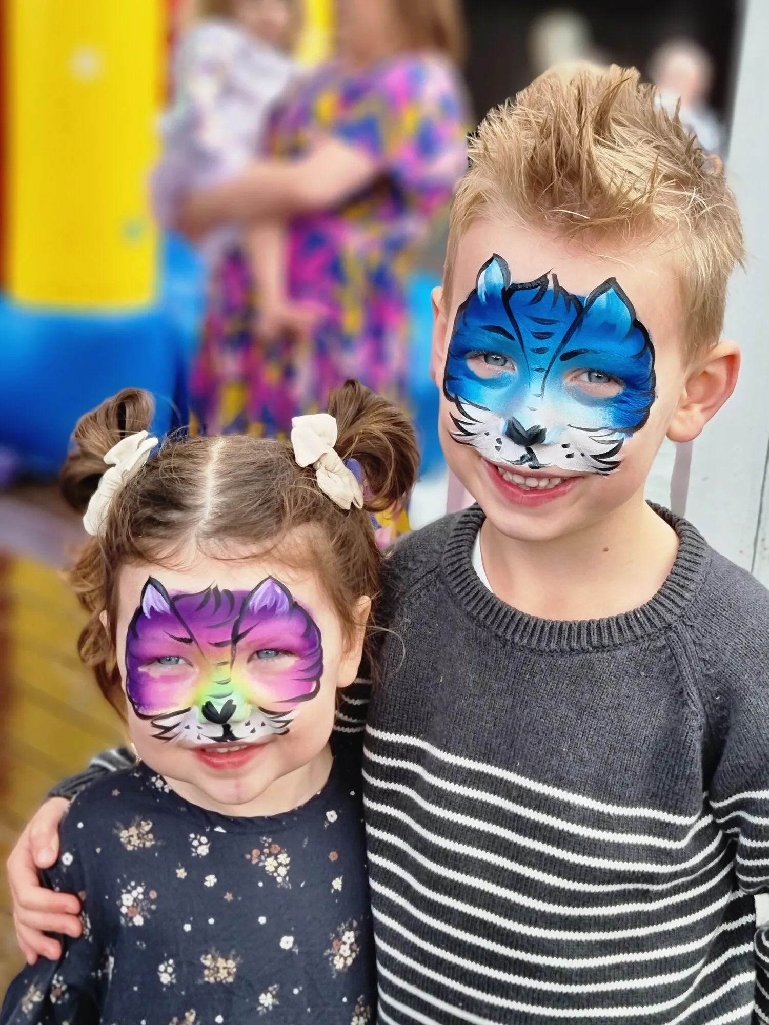 Sibling cat faces