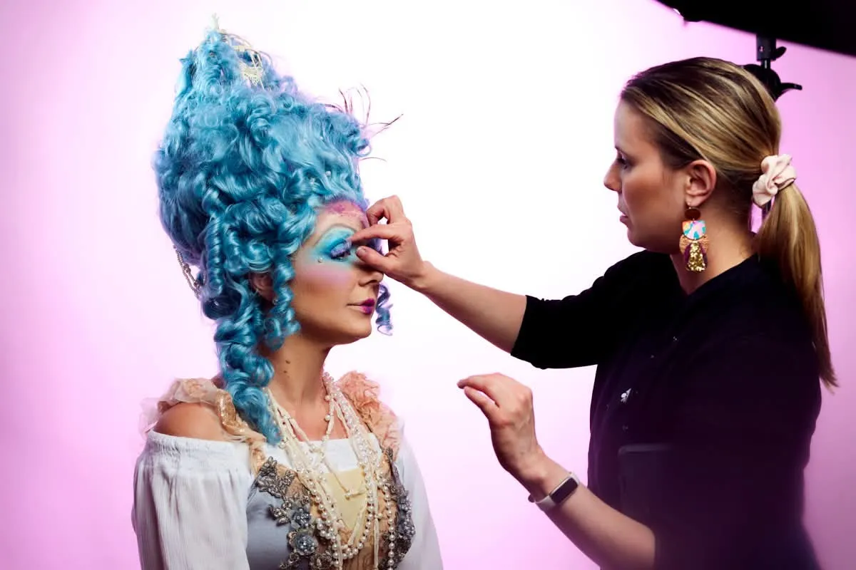 Blue baroque wig editorial makeup