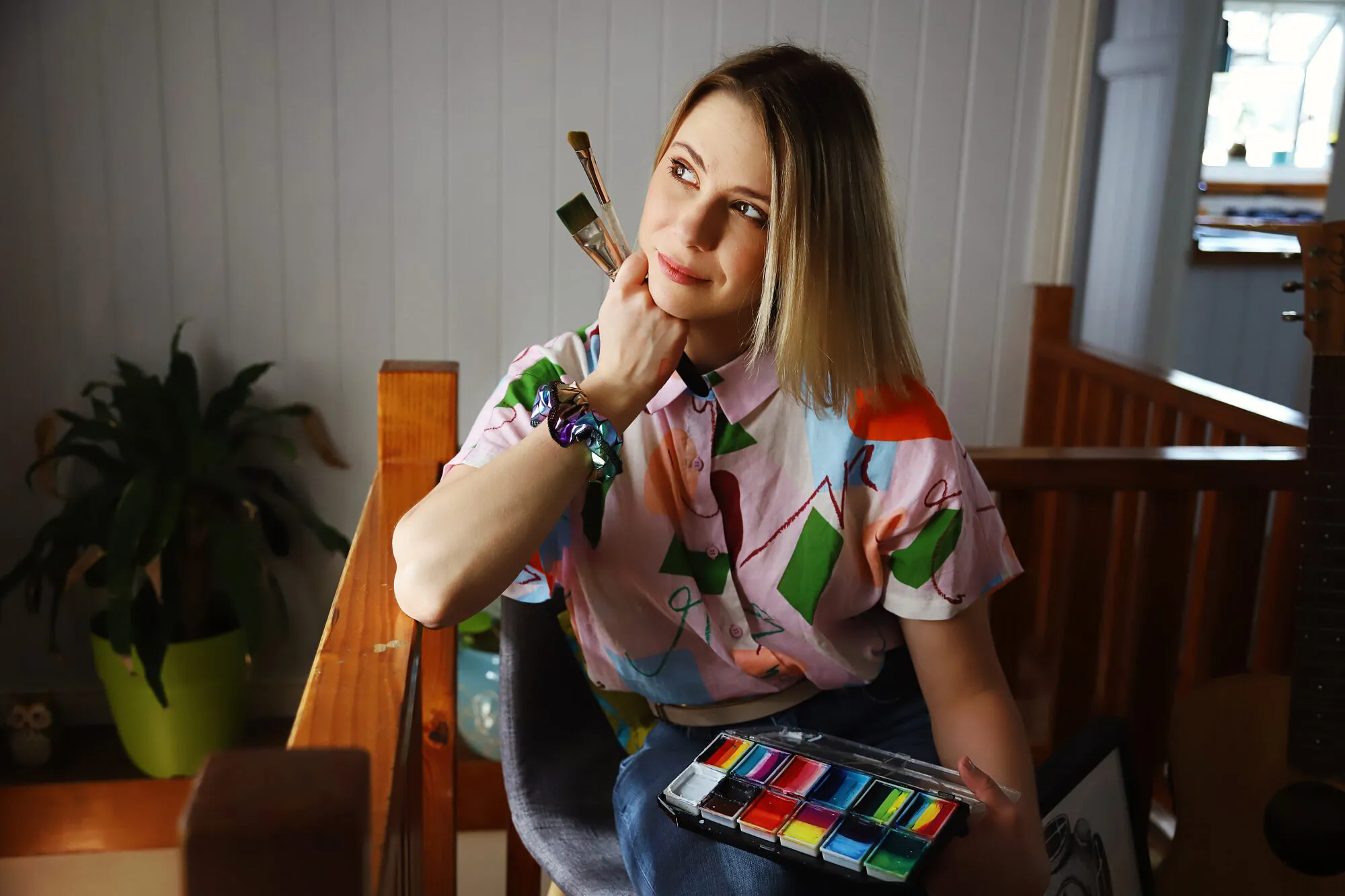 Nadia in her studio with a face paint palette